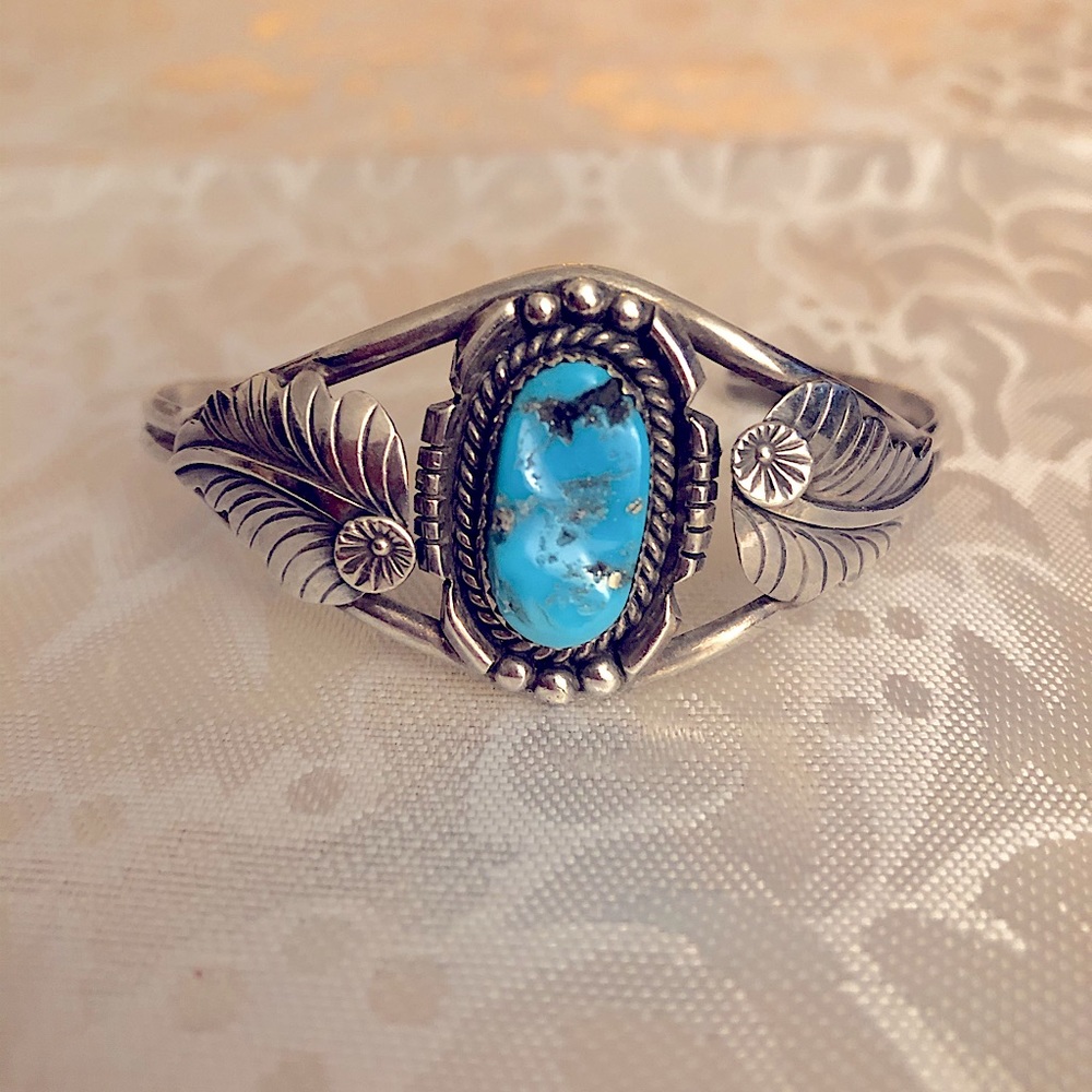 Navajo silver & turquoise bracelet with feather.